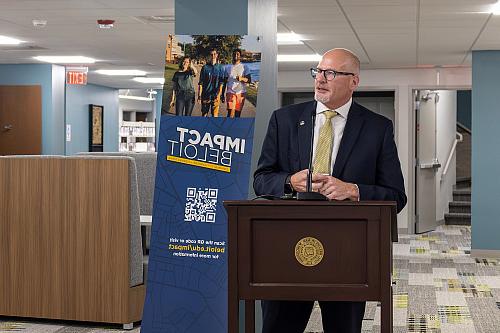 Wisconsin Department of Administration Deputy Secretary Paul Hammer speaks to the crowd.